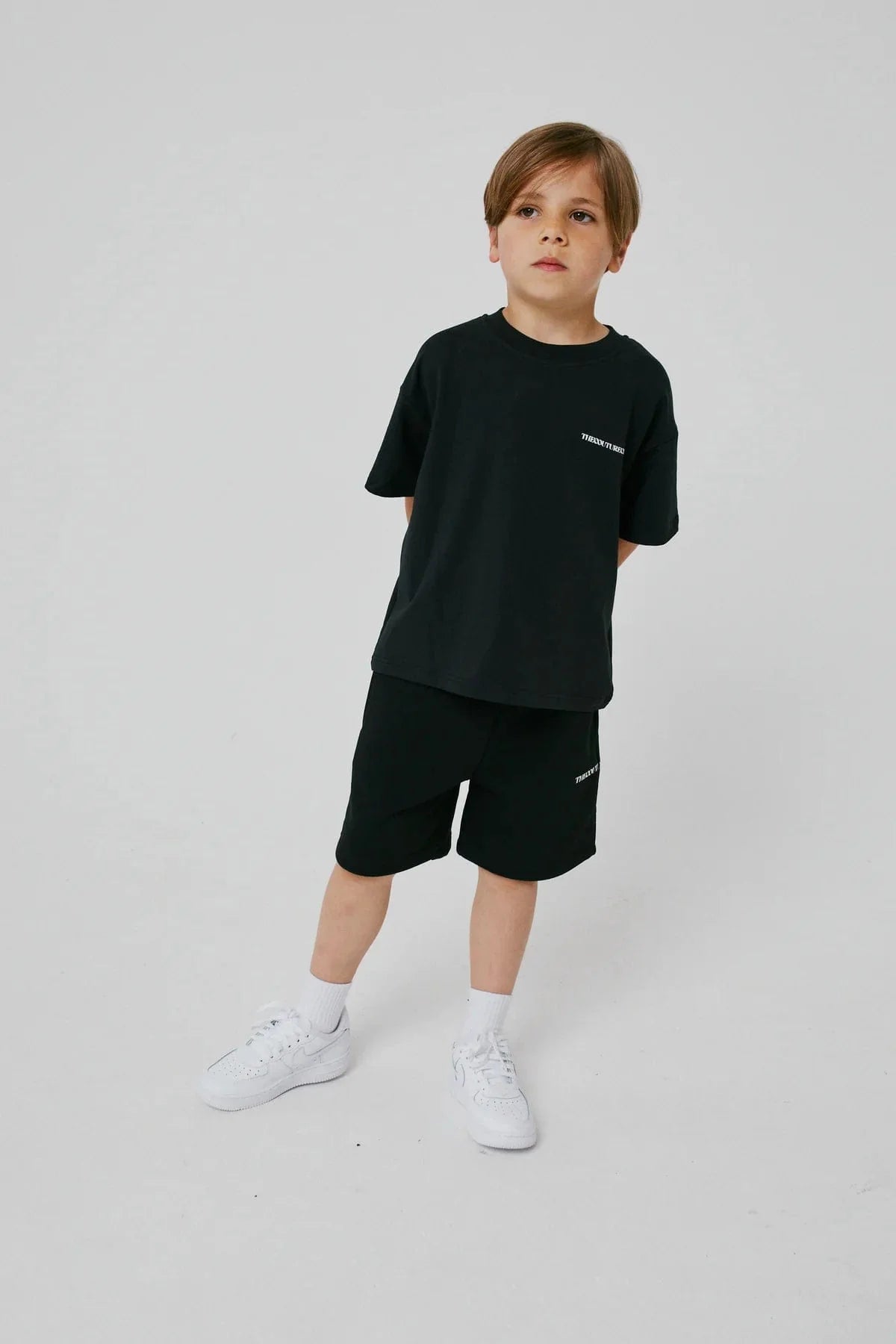 The Couture Club Kids Raw Seam Shorts in Black