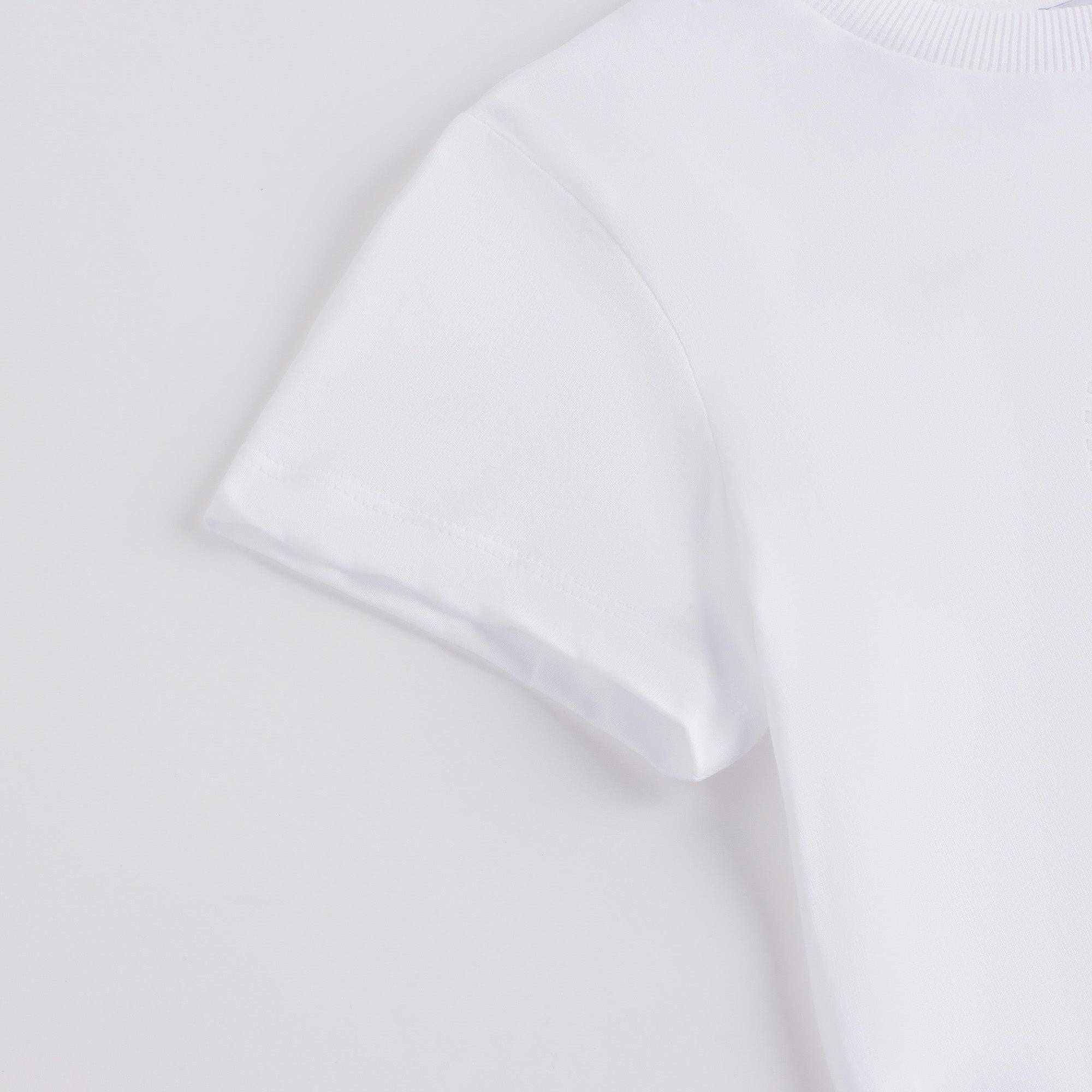 T-shirt en coton blanc avec logo circulaire pour garçons et filles