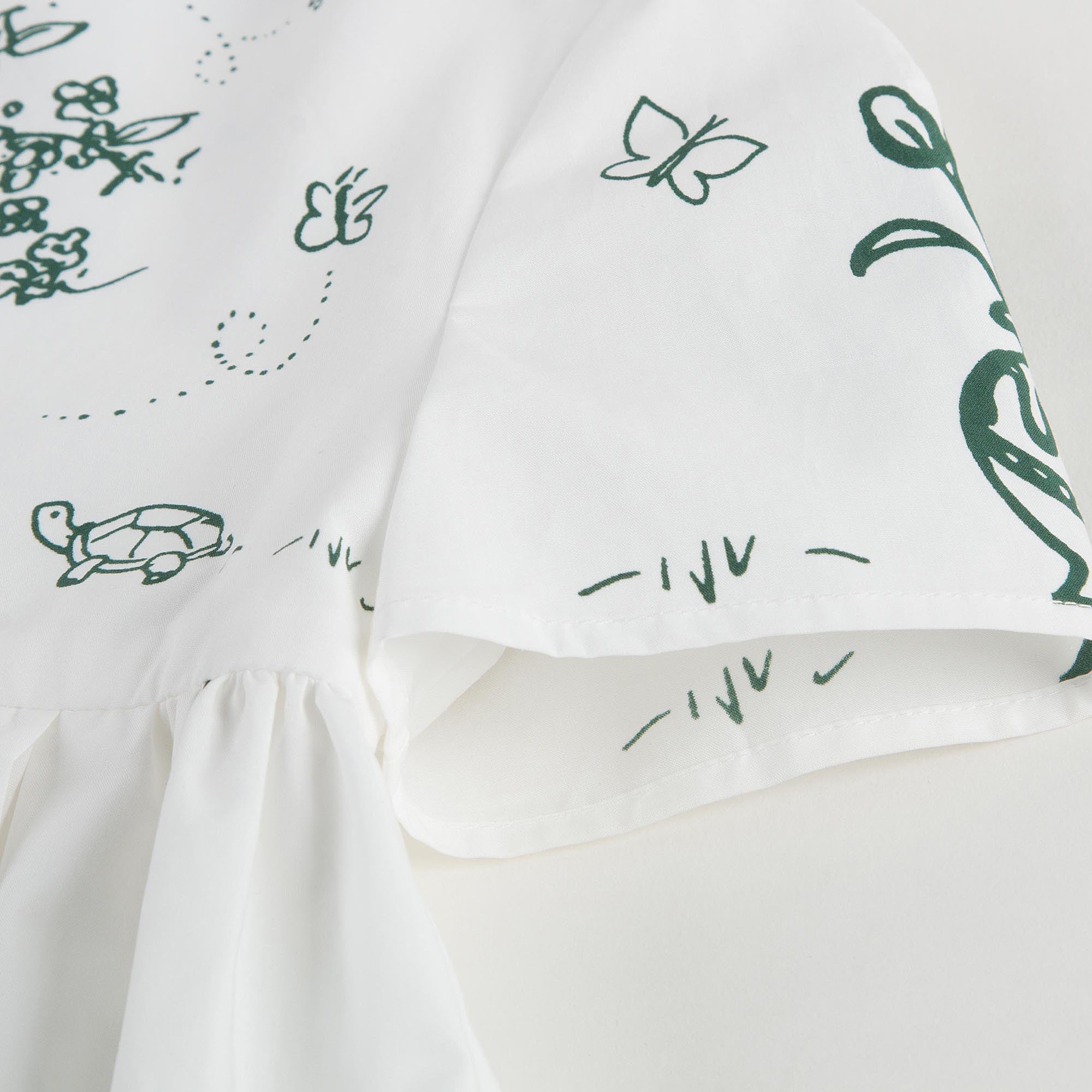 Robe Fille Bébé Blanche avec Imprimés Garnitures Jardin Botanique