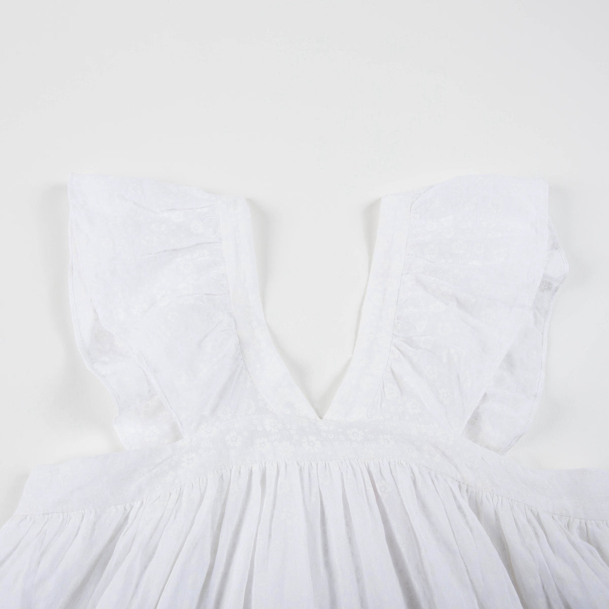 Robe blanche à fines bretelles pour fille