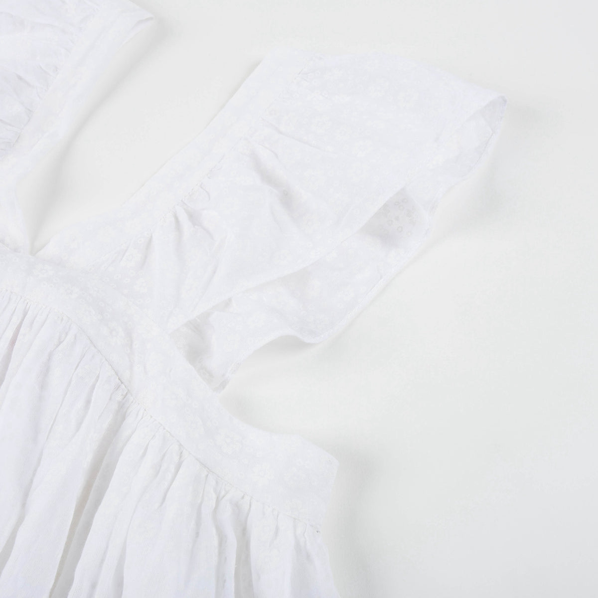 Robe blanche à fines bretelles pour fille