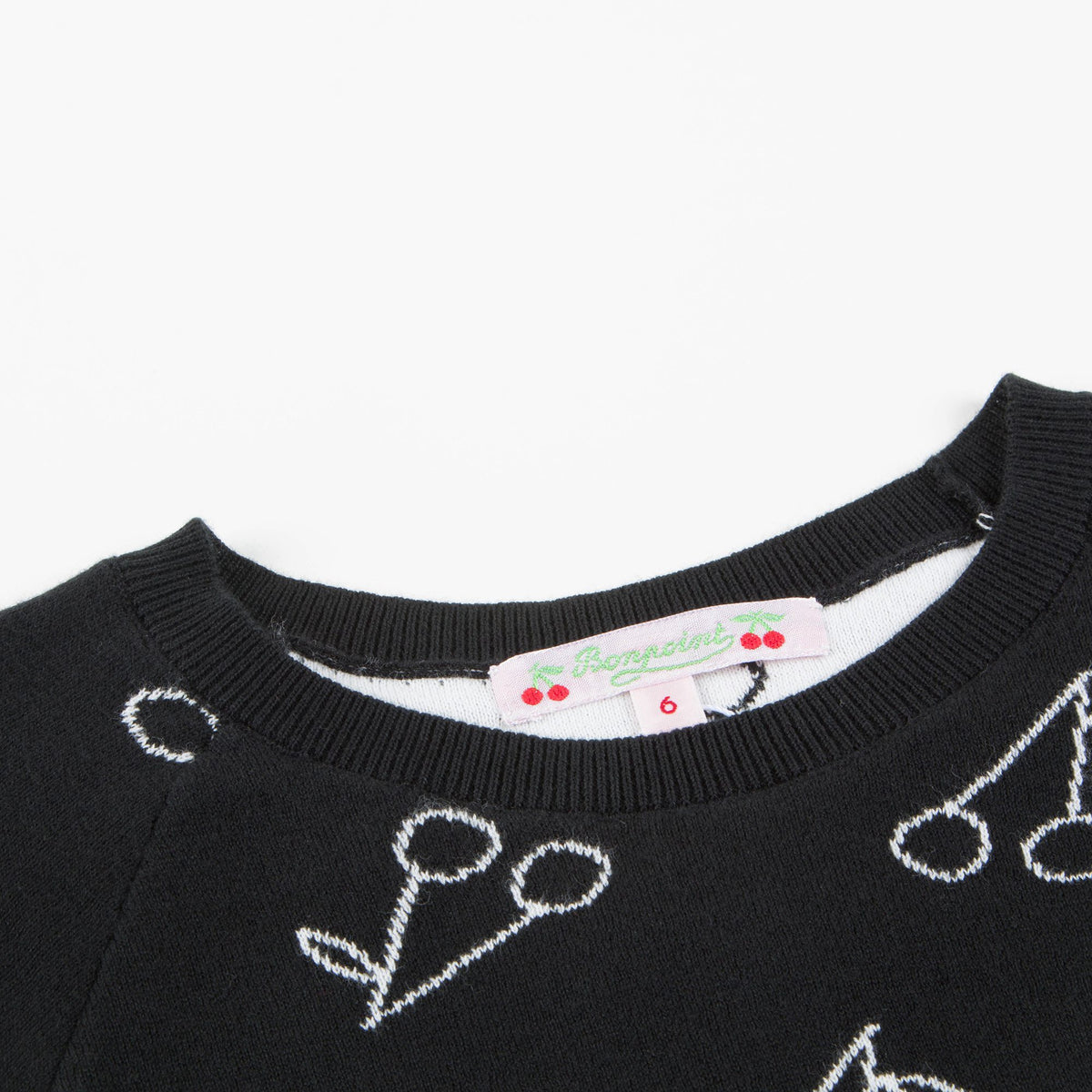 T-shirt en maille noir à imprimé cerises blanches pour fille