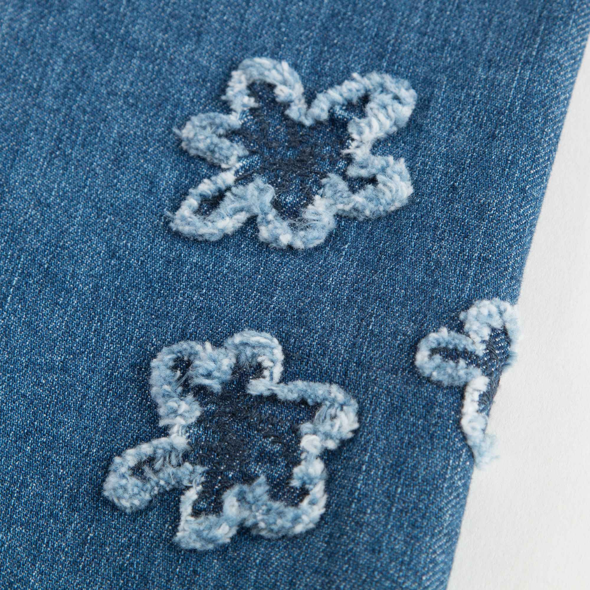 Baby Girls Denim Blue Cotton Jeans With Flowers Trims