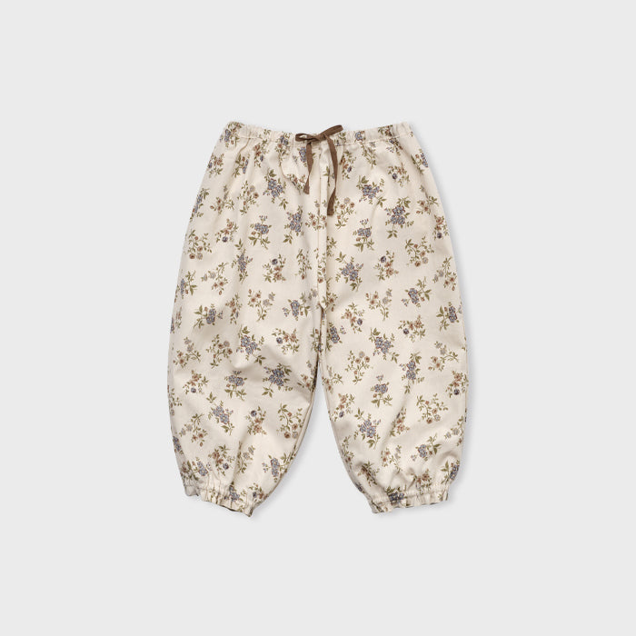 Pantalon en coton fleuri beige pour bébés filles