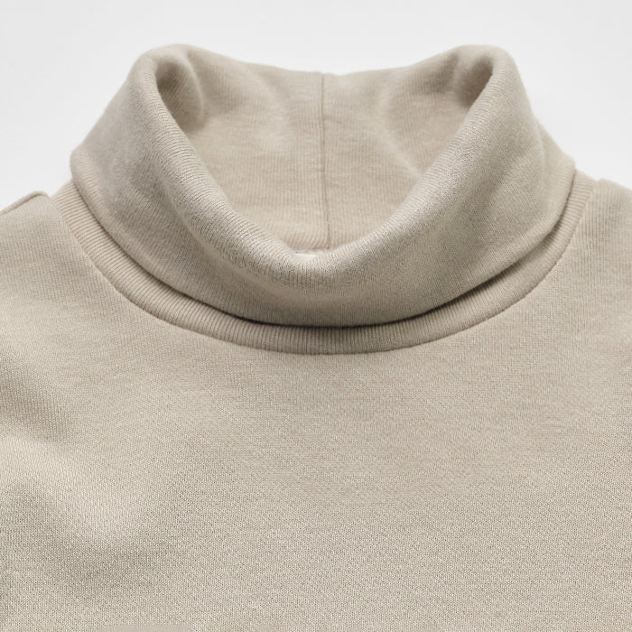 Col roulé en coton beige pour fille