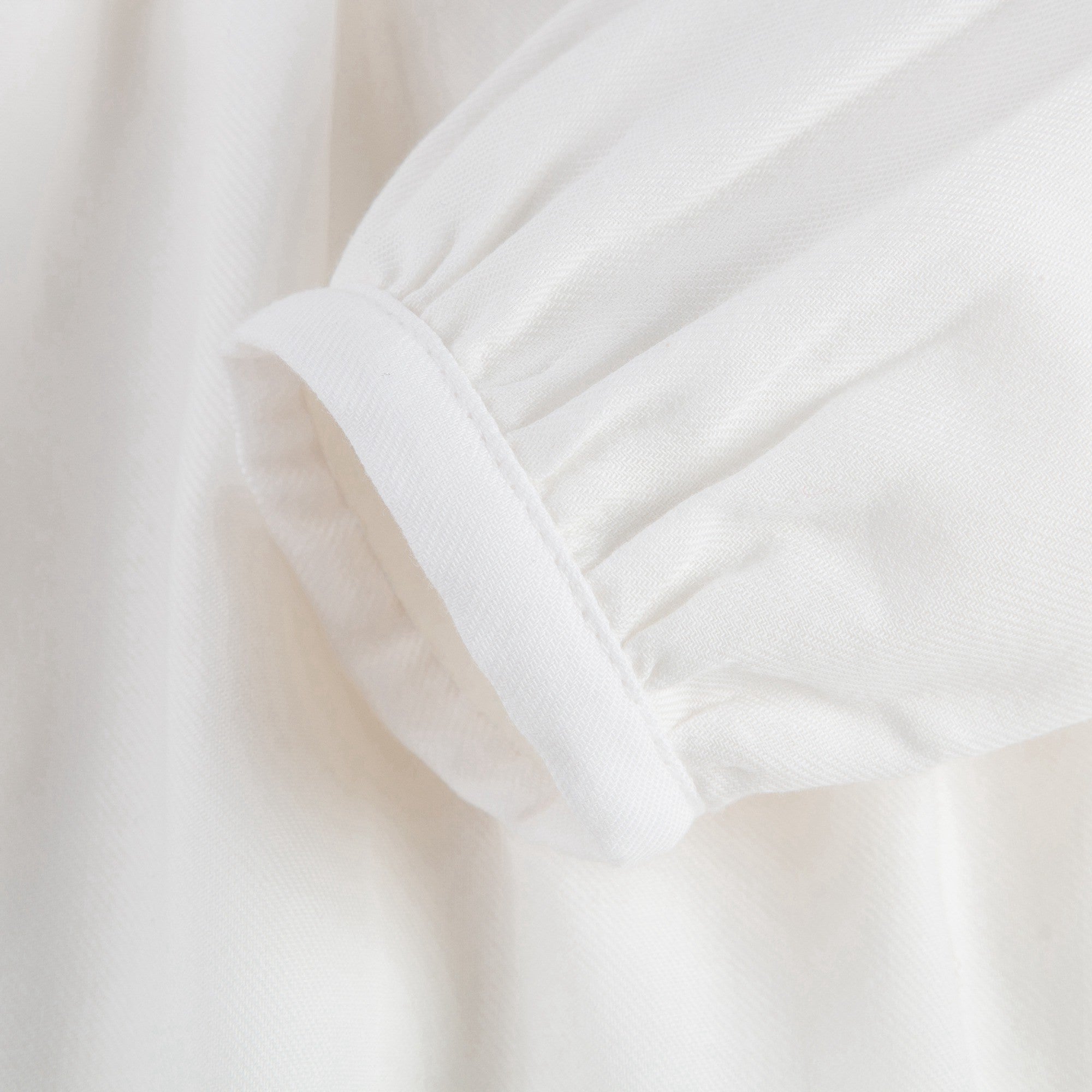 Baby Girls Ivory Cotton Blouse With Ruffle