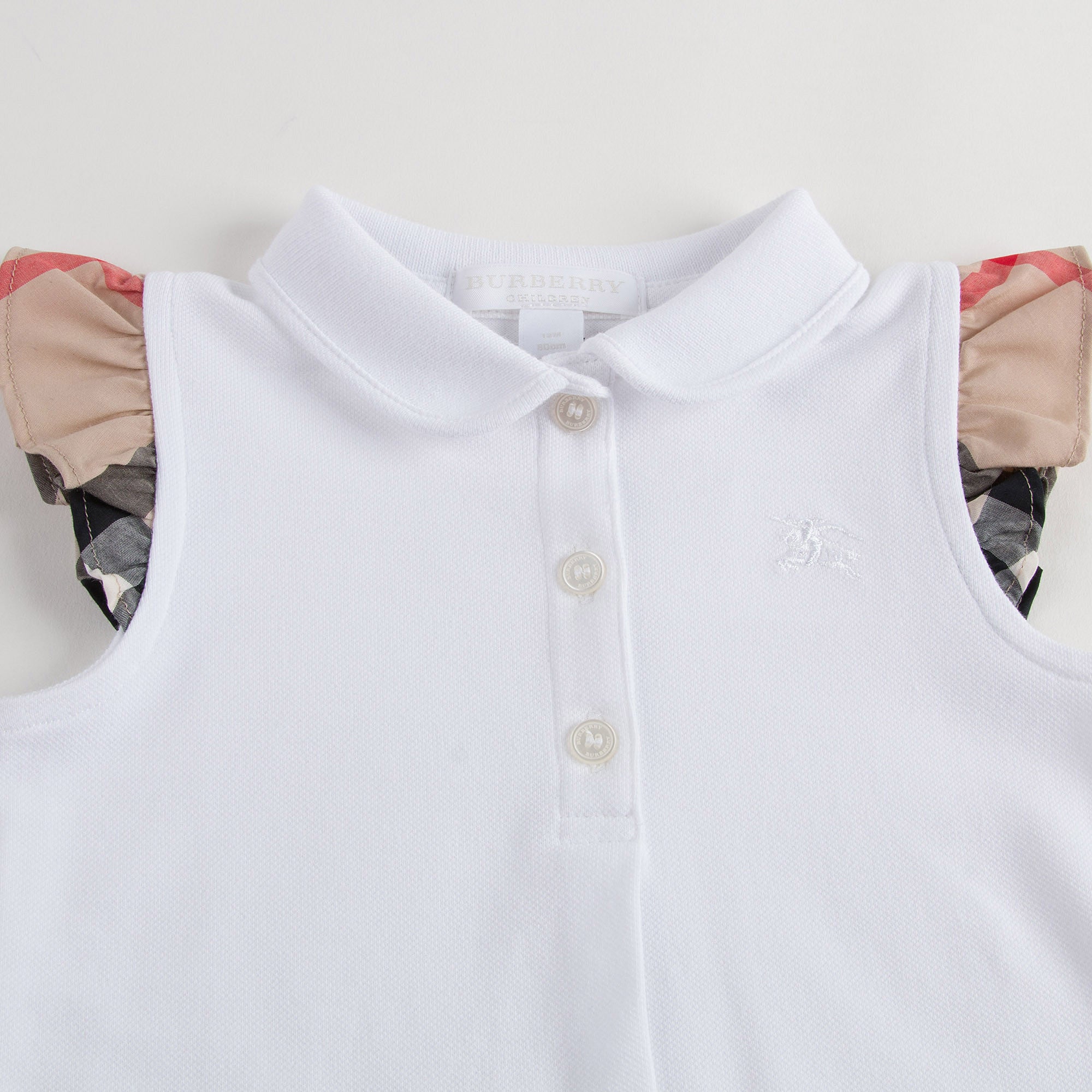 Baby Girls White Polo Shirt With Check Ruffles