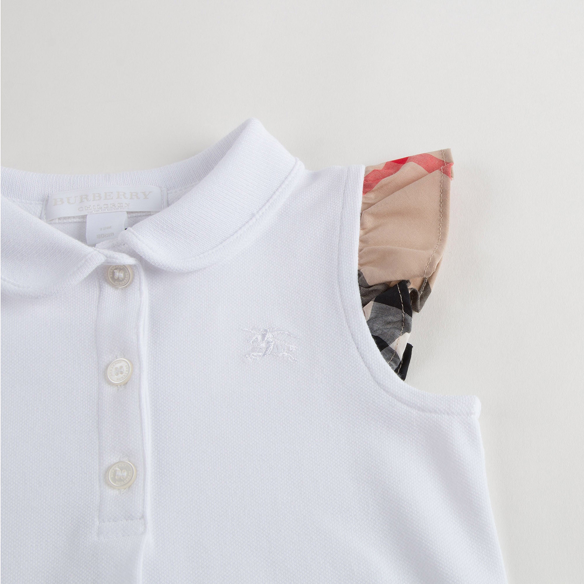 Baby Girls White Polo Shirt With Check Ruffles