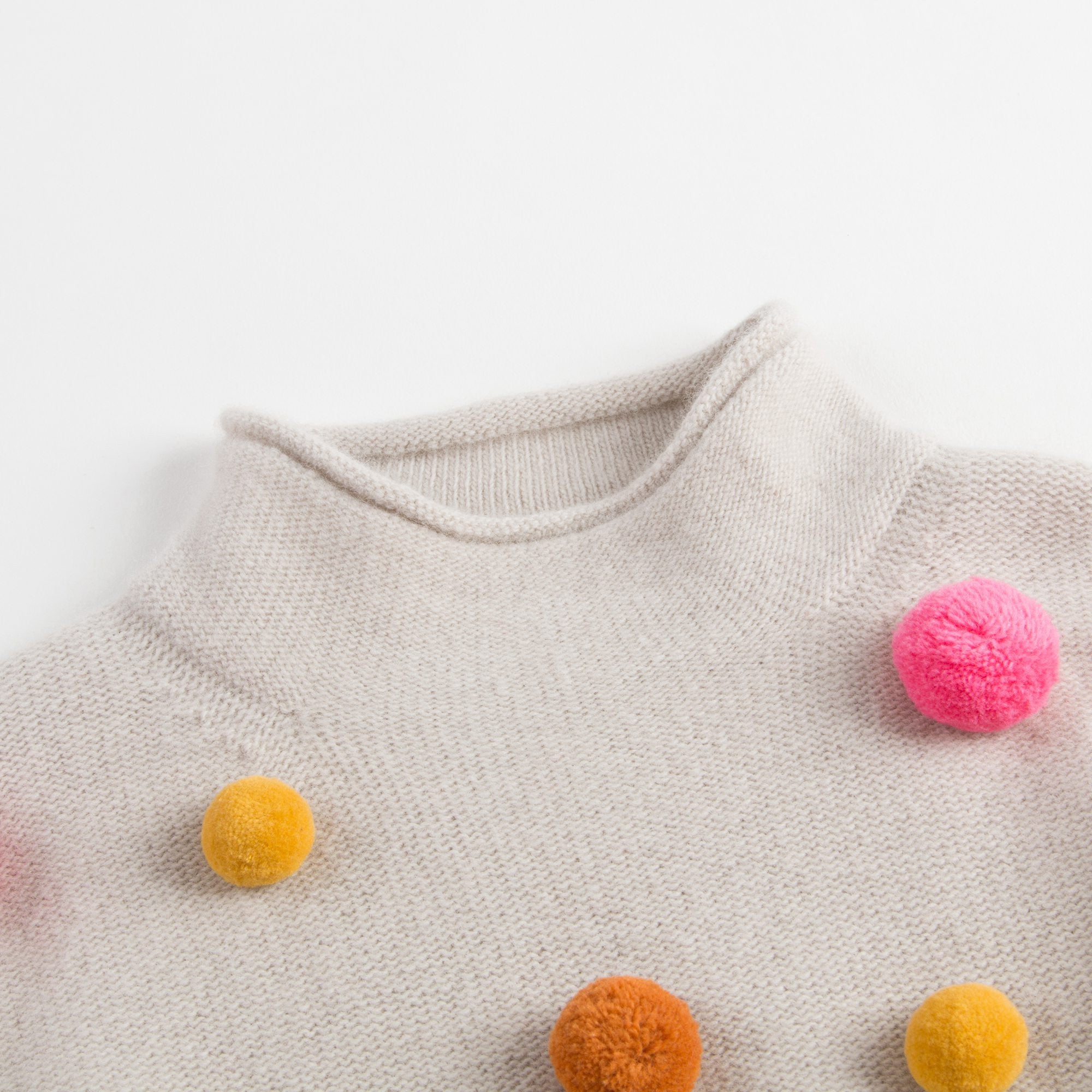 Girls Beige Wool Sweater With Pom-Pom Trims