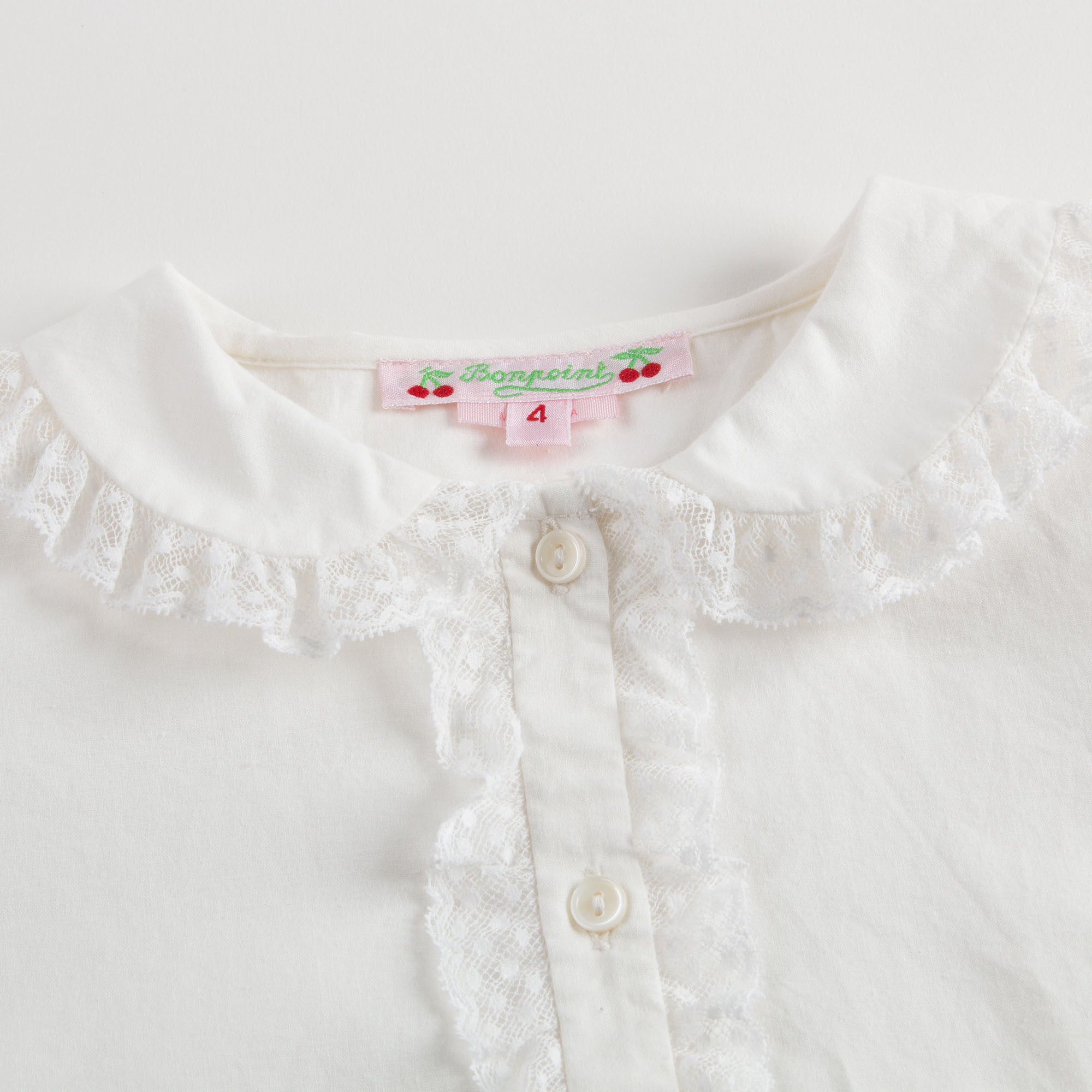 女大童白色蕾丝边衬衫