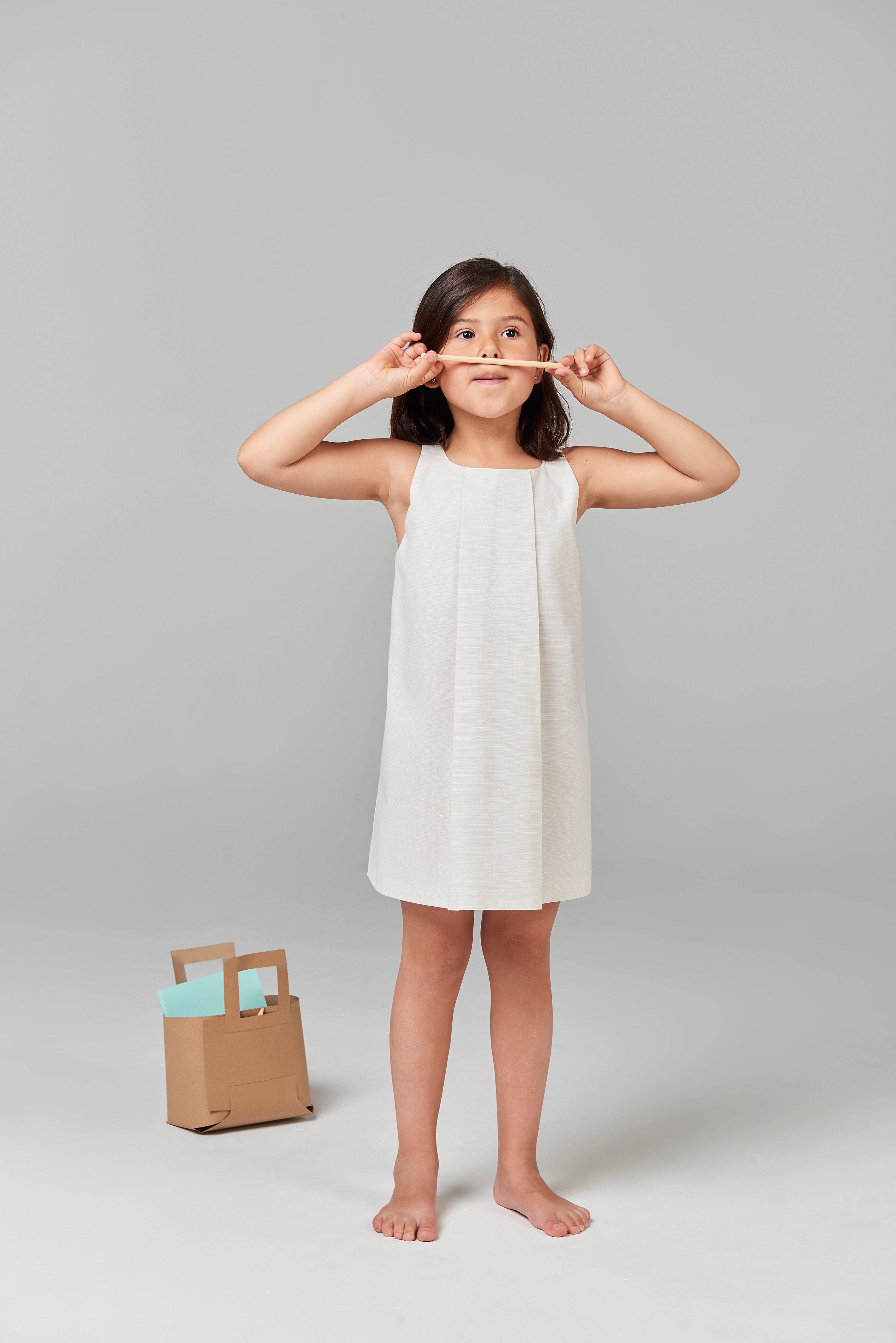 Girls Sand Dress With Curved Back